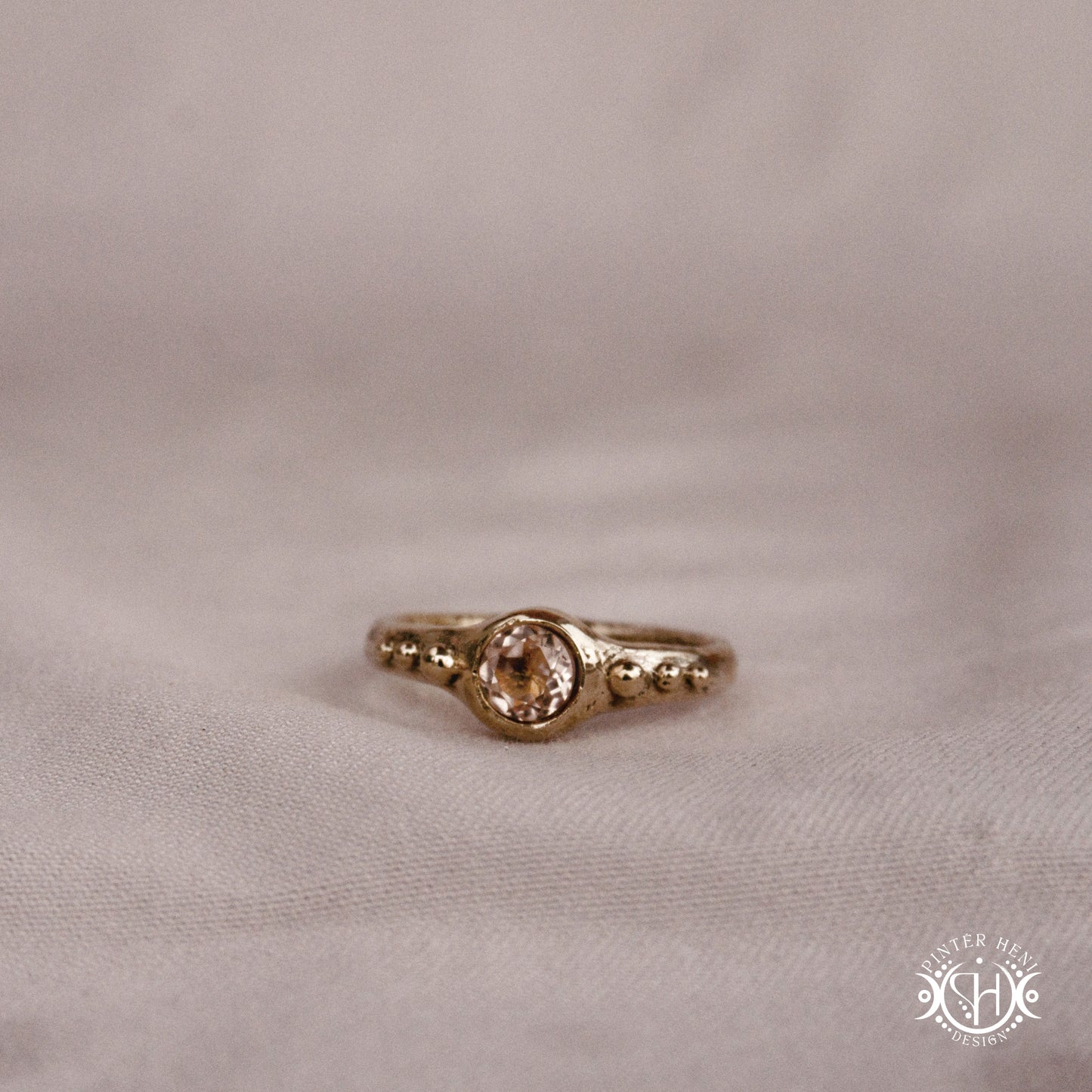 Star Cluster Ring with morganite and surrounding bead details in handcrafted metal