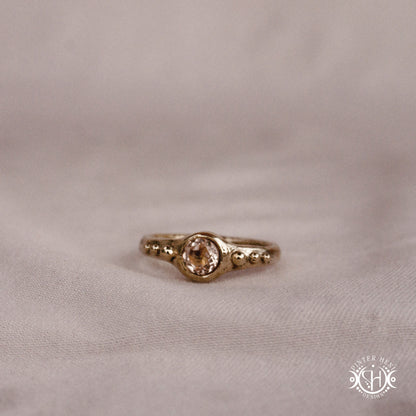 Star Cluster Ring with morganite and surrounding bead details in handcrafted metal