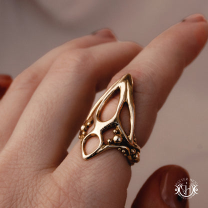 Void Ring open sculptural axial handmade ring with negative space organic structure, on hand.